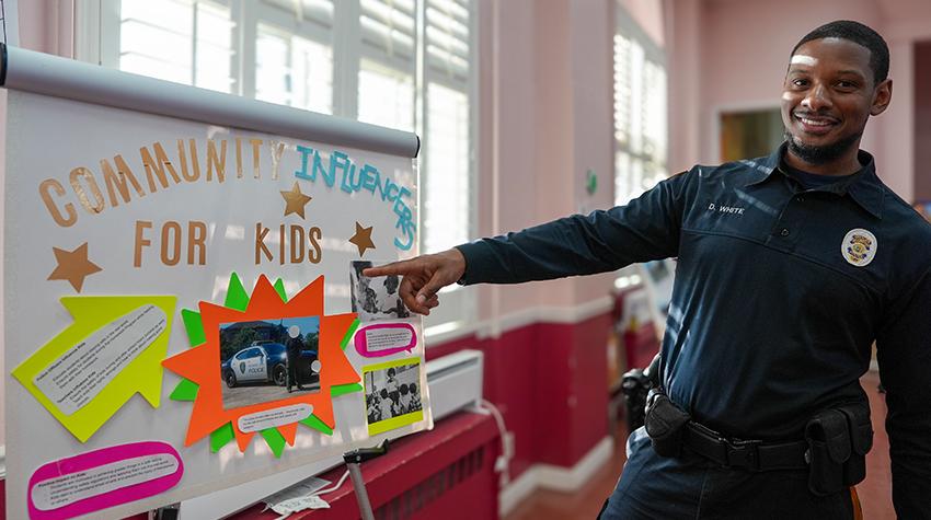 A police officer viewing one of the displays A police officer viewing one of the displays