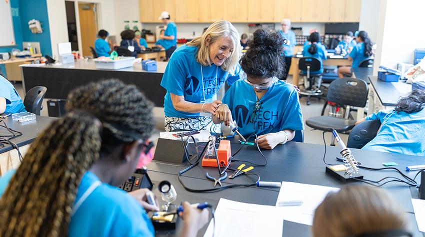 Tech Trek participants soldering circuit boards Tech Trek participants soldering circuit boards