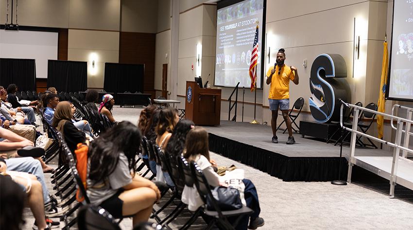 A presenter talking with EOF students A presenter talking with EOF students