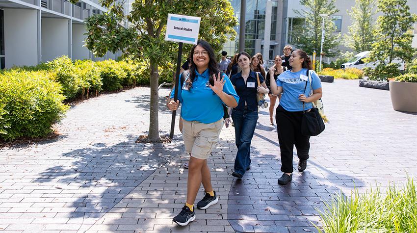 A TALON leading students around campus A TALON leading students around campus