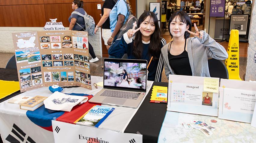Students tabling at the Study Abroad Fair Students tabling at the Study Abroad Fair