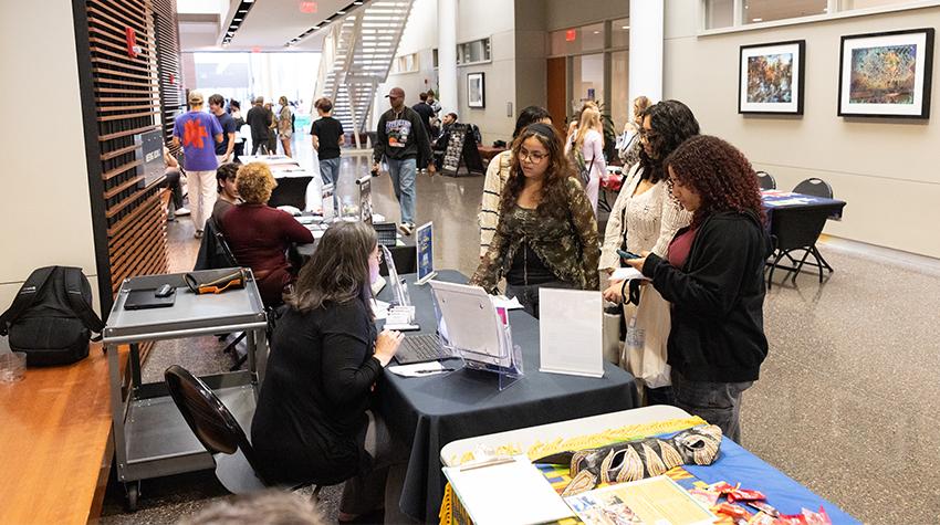 Students receiving information during the fair Students receiving information during the fair