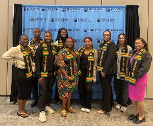 Graduating Africana Studies students proudly wear kente stoles during Stockton’s cultural recognition ceremony.