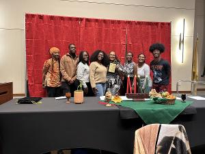 Africana Studies students and faculty gather for a Kwanzaa celebration, honoring heritage, community, and achievement.