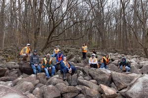 Geology students gain real field experience by studying massive boulder deposits in one of the program’s many outdoor learning sites.