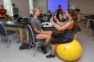 In lab-based coursework, students develop assessment and neuromuscular evaluation skills through guided, hands-on practice.