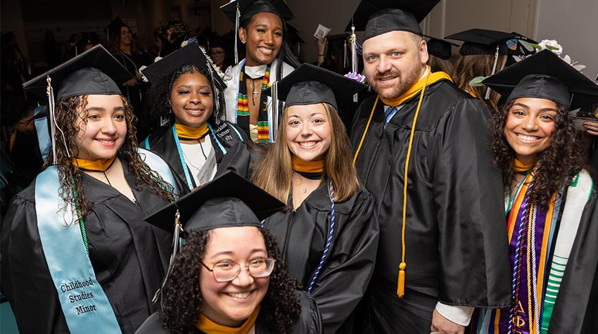 Undergraduates posing for a photo Undergraduates posing for a photo