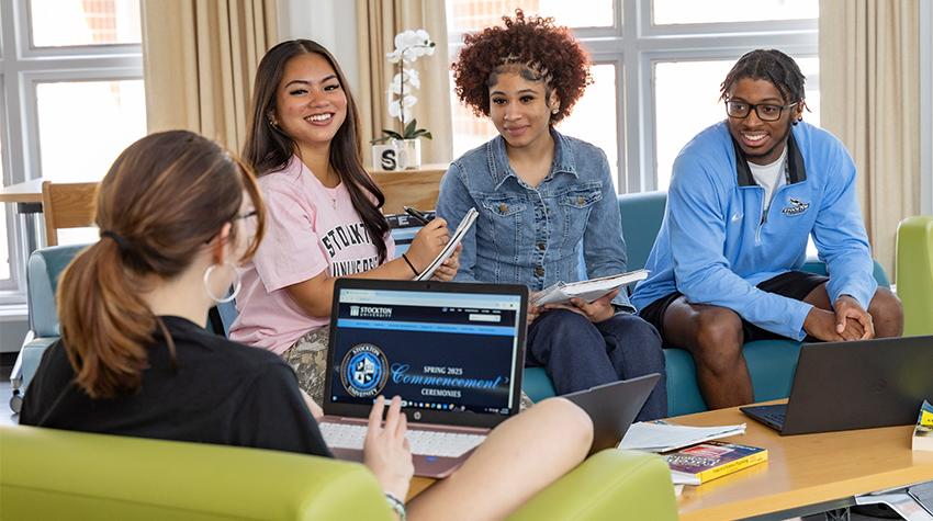 Students talking in a Stockton dorm in Atlantic City Students talking in a Stockton dorm in Atlantic City