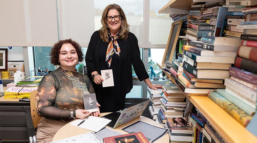 A faculty member and student amidst books by Catharine Sedgwick A faculty member and student amidst books by Catharine Sedgwick