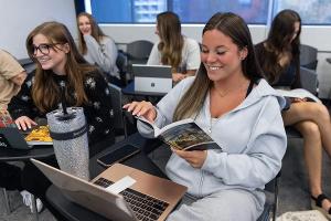 Literature students read, annotate, and discuss course materials in an active, collaborative classroom environment.