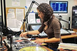Stockton University Communication Studies student hosts a campus radio show, developing skills in audio production, media programming and broadcast journalism.