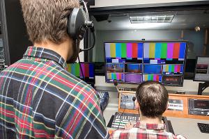 Stockton University Communication Studies students operate a professional broadcast control room, producing live television and media content.