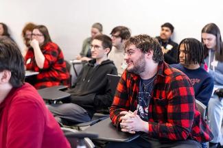 Students in a Stockton University Digital Studies class engaging with concepts in digital media, design, and emerging technology.