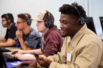 Students use digital tools and multimedia platforms to design and test interactive learning experiences.