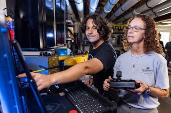 Students work alongside faculty using advanced marine technology to analyze ocean data and support real-time research.
