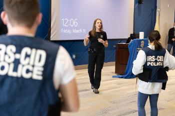 Students take part in a live IRS criminal investigation demonstration, exploring forensic accounting, fraud examination, and financial crime procedures.