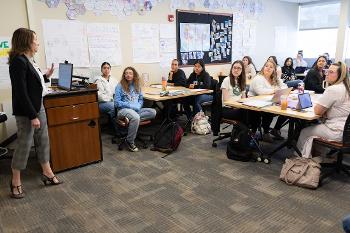 Students in Stockton University’s Teacher Education program participate in a classroom discussion and collaborative learning activity with faculty and peers.