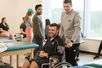 Stockton University Health Science students develop practical skills through interactive learning experiences focused on patient care, rehabilitation, and teamwork.