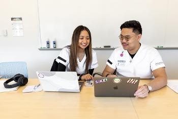 Students collaborate with peers while preparing for careers in healthcare, rehabilitation, clinical services, and professional graduate programs.
