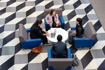 Graduate students work together in a flexible, discussion-based setting designed for leadership, problem-solving and applied business learning.