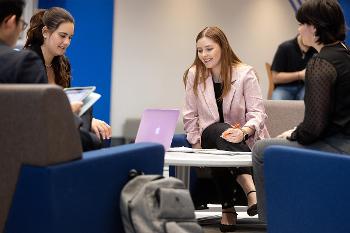 Stockton MBA students collaborate in a modern learning space, building the leadership, communication and business skills needed to advance their careers.