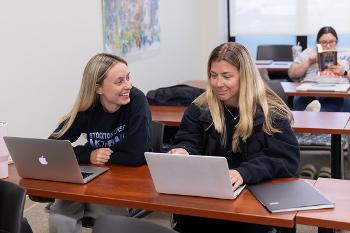Stockton University nursing students collaborate in the classroom, combining coursework, peer learning and preparation for clinical practice.