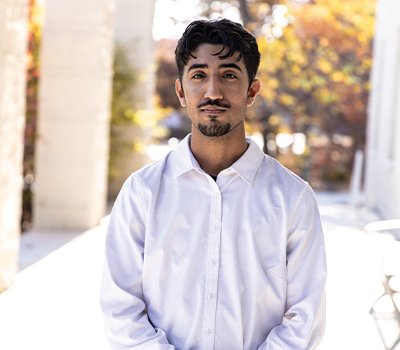 Outdoor headshot portrait of Ammar Farooq