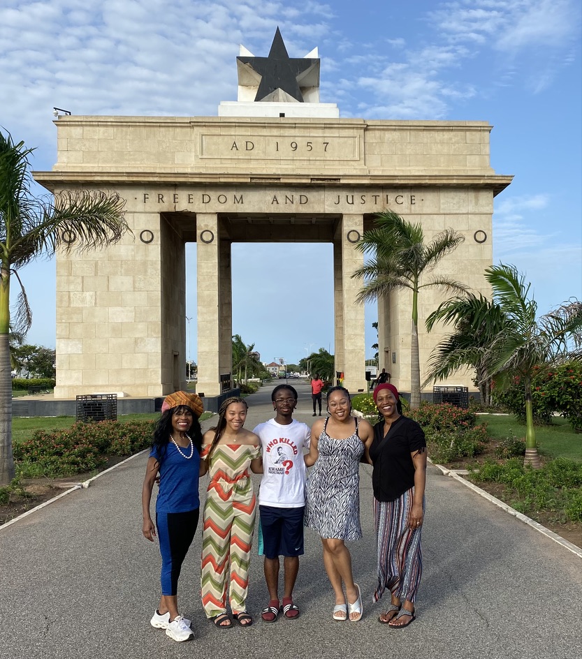 Stockton students, faculty and staff pose for a group photo in Ghana.