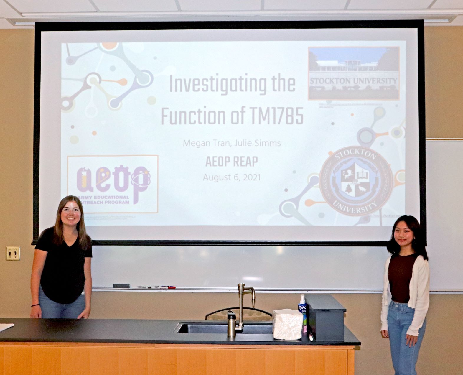 Julie Simms and Megan Tran present their STEM research at the Research and Engineering Apprenticeship (REAP) Symposium at Stockton University.