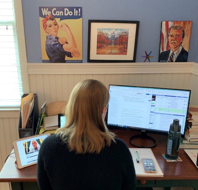 Claire Abernathy works from home during a recent C2C town hall meeting on COVID-19.