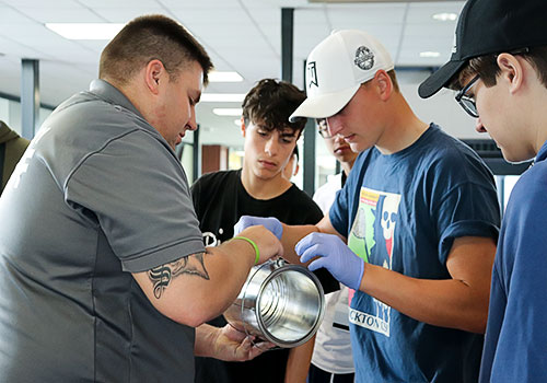 Officer teaching student