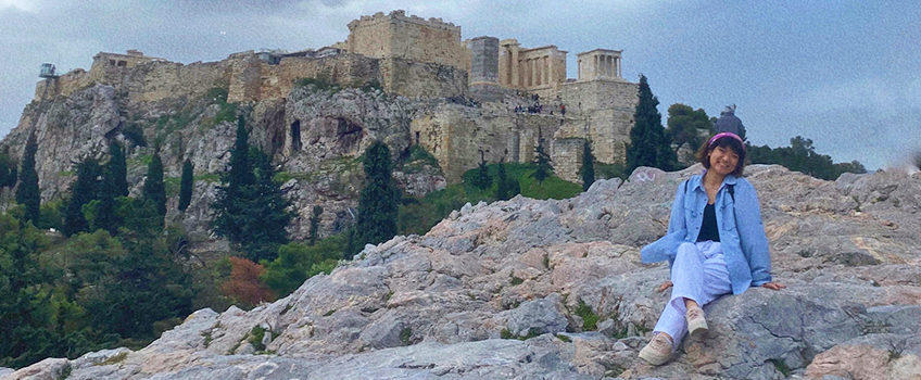 Sophomore Eline Xia sits in front of the Acropolis of Athens during her spring 2023 semester abroad. Xia won the highly competitive Gilman International Scholarship, which supports students studying abroad.