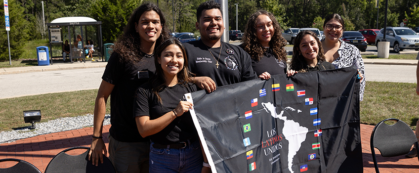 Members of Los Latinos Unidos raised the flag for Hispanic Heritage Month on Friday, Sept. 15.