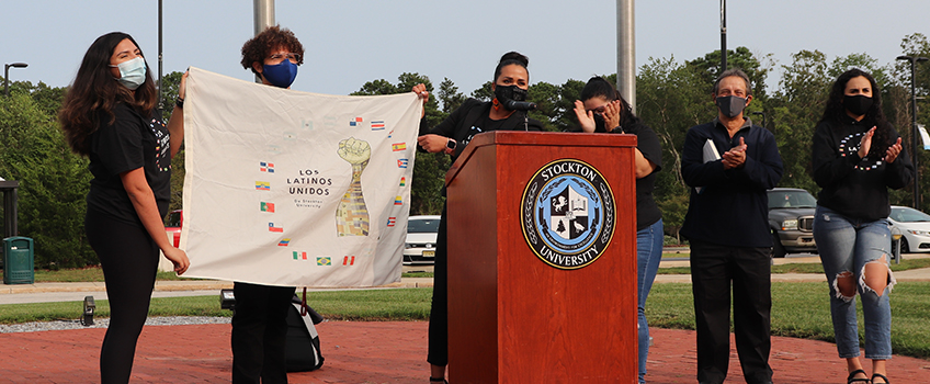 hispanic month flag raising