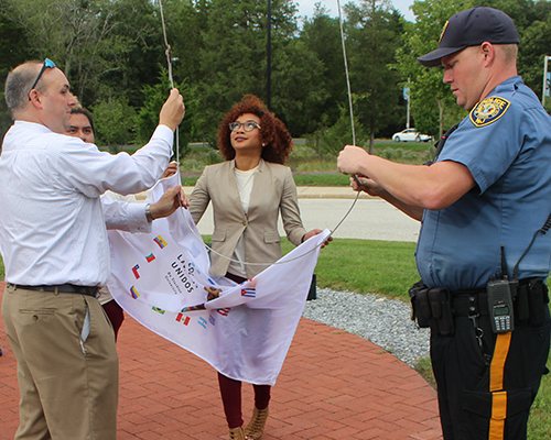 Los Latinos Unidos flag raising