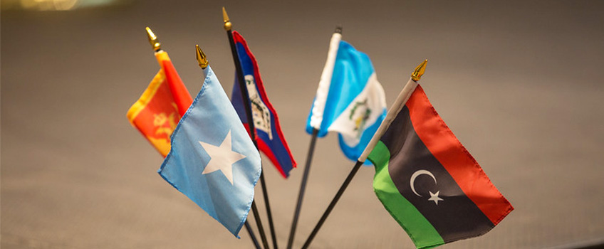 Multiple flags on top of a table at the Multicultural Brunch. 