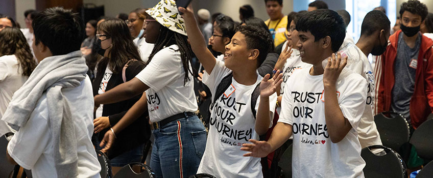 Students cheering at a workshop