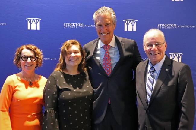 LIGHT Faculty Director Jane Bokunewicz, President of the New Jersey Tourism Industry Association Lori Pepenella, Lloyd D. Levenson and Stockton University President Harvey Kesselman stand together for a photo.