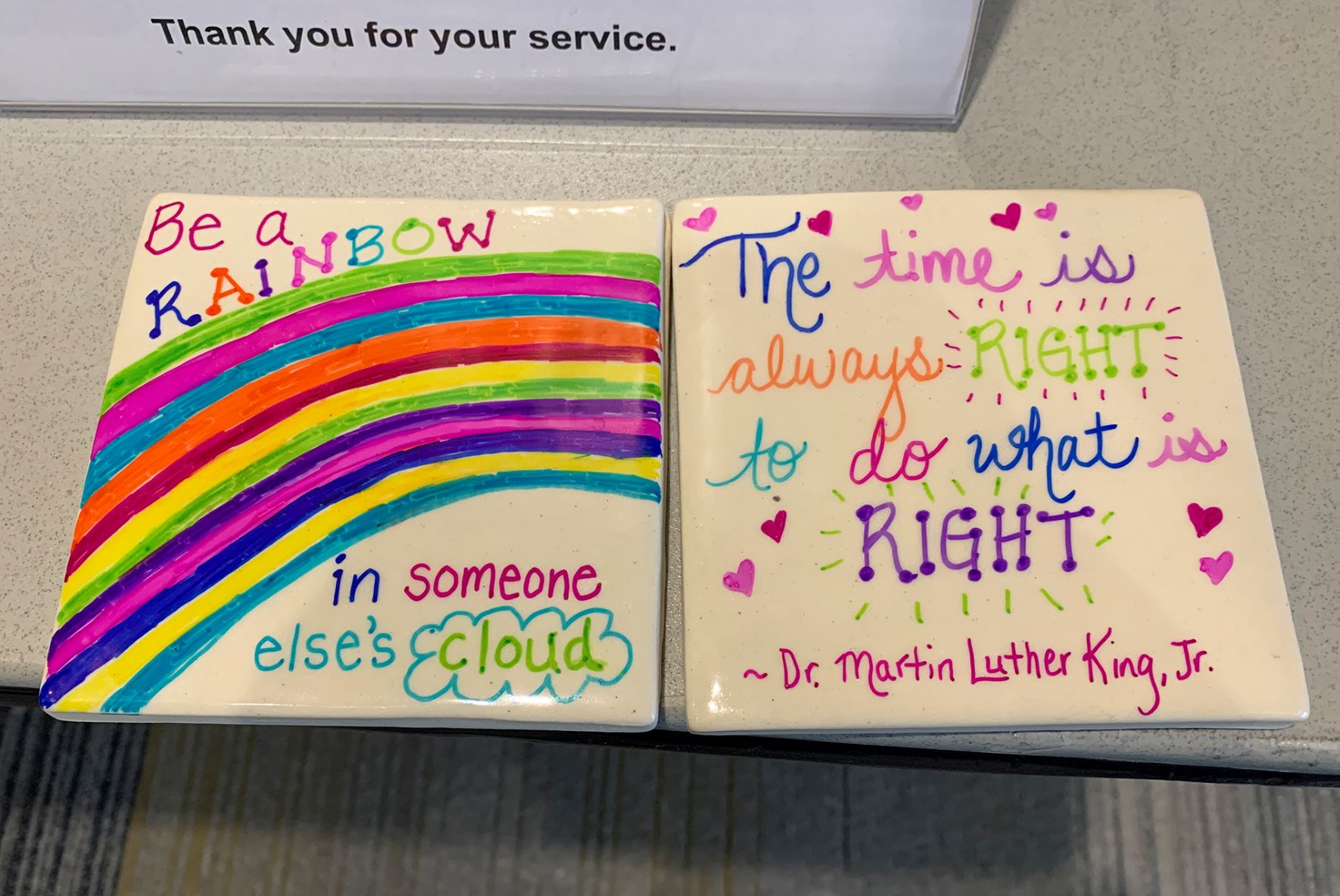 Two of the over 200 tiles that were painted by Stockton community members during the 18th annual MLK Day of Service.