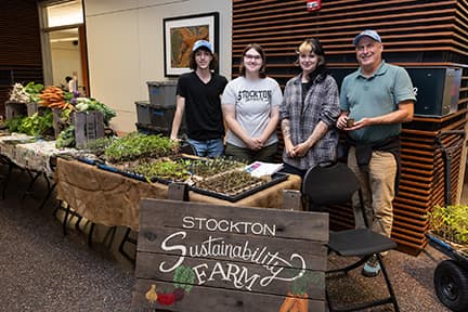 Ron Hutchison and Stockton University students from the Sustainability Farm