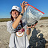 Paige Baney researches horseshoe crab habitat on Delaware Bay. 