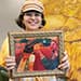 Sandy Hanna with her painting 'Our Lady, Queen of Palestine'