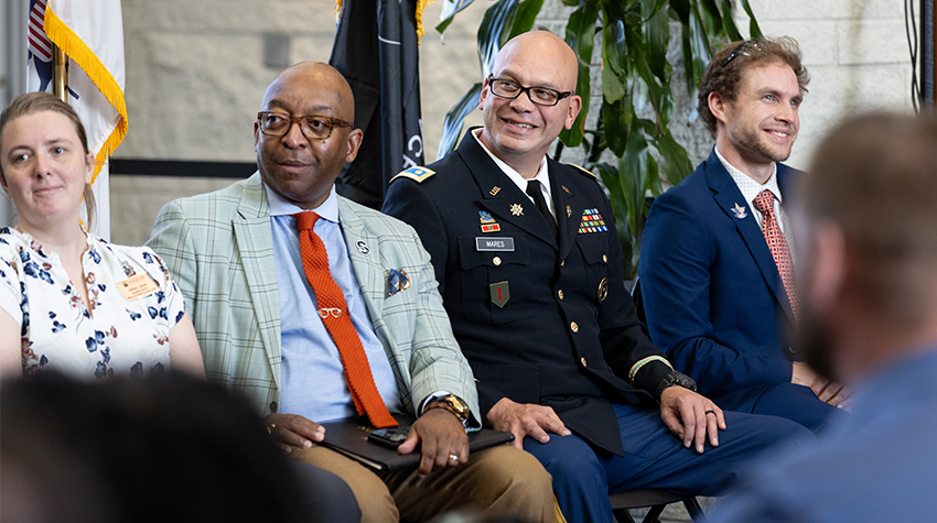 (L-R): Ashley Jones, assistant director of the MVSC; William Latham, interim vice president for Student Affairs; Major Mares (Ret.); and student Michael Smalling. 