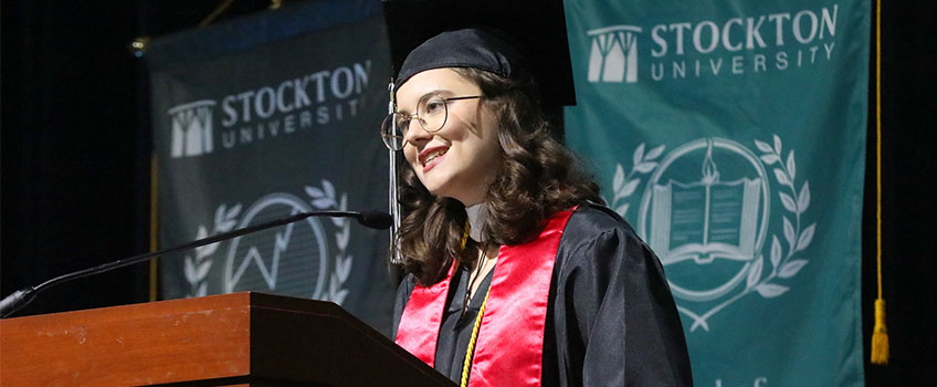 student speaking at Commencement