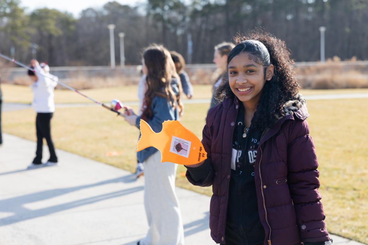 Student with fishing reel at Tween Tech