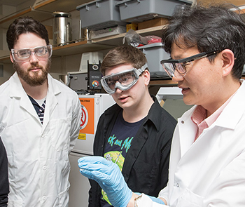 Image of Dr. Wooseok Ki, Dr. Shulman and chemistry research students at Stockton University