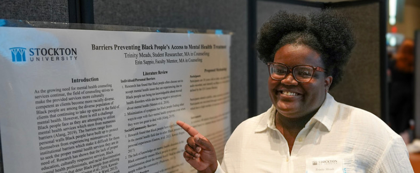 Graduate student Presenting Their Research