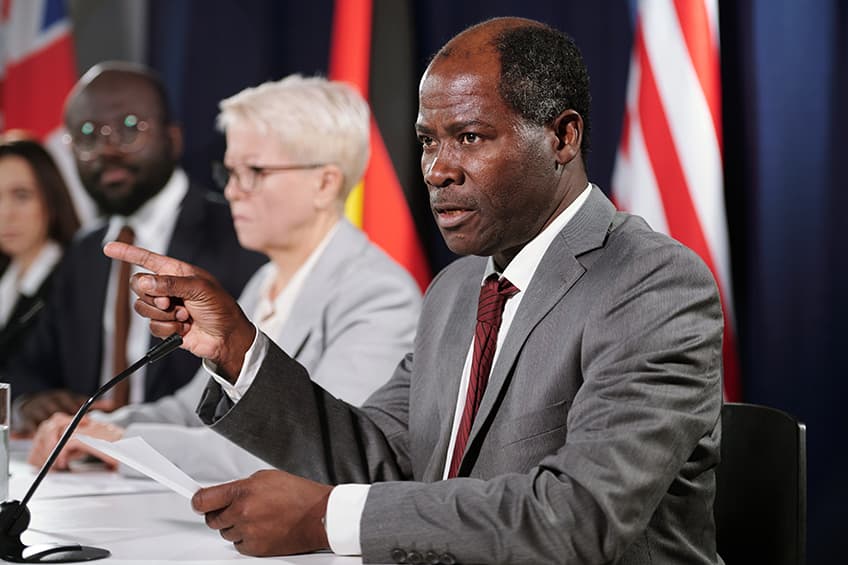 Policymaker speaking to an audience.