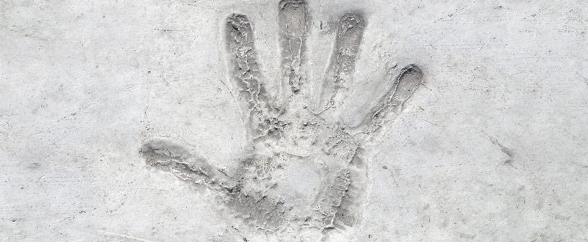 Hand print in concrete