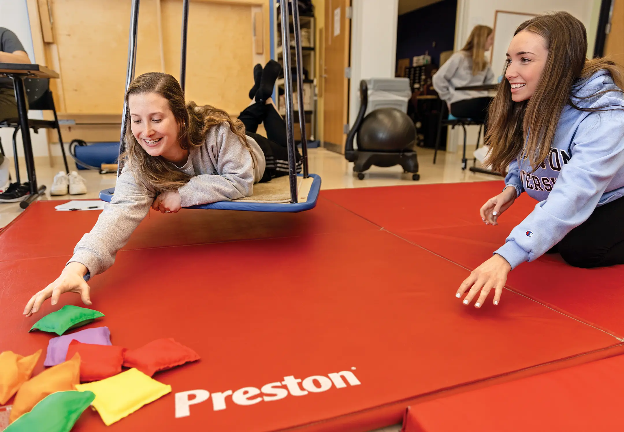 Students practicing muscle strengthening techniques in a Stockton Classroom